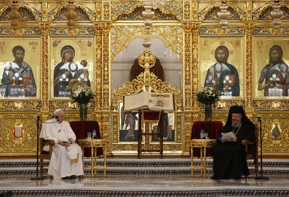 Pope Francis and Orthodox Archbishop Chrysostomos II of Cyprus attend a meeting with the Orthodox bishops who are members of the Holy Synod at the Orthodox cathedral Dec. 3 in Nicosia, Cyprus. (CNS/Paul Haring)