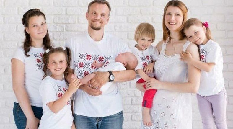 Volha Zalatar, a Catholic, pictured in an undated photo with her husband and five children, was sentenced in Belarus to four years in jail for forming an "extremist group" and public order offenses, despite testimony by her lawyer that she'd been tortured