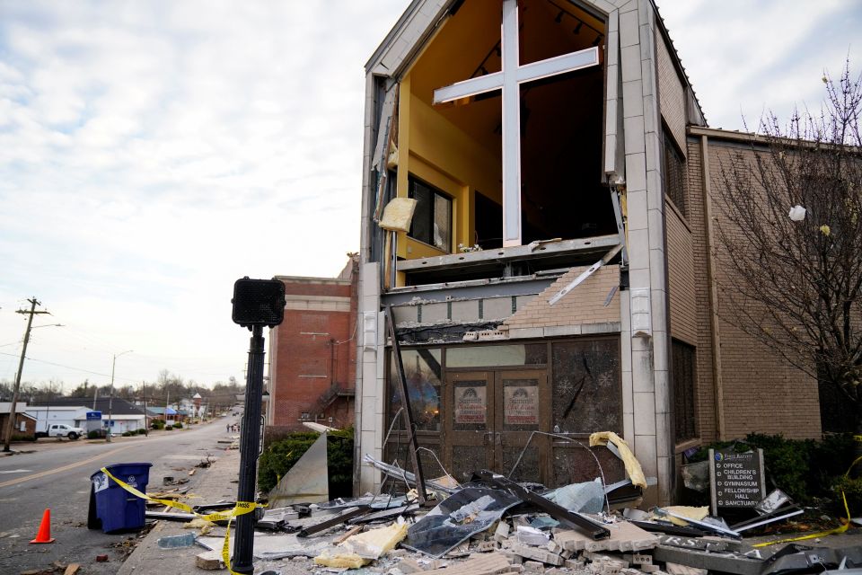 Debris surrounds a badly damaged church in Mayfield, Ky., Dec. 11, 2021, after a devastating tornado ripped through the town. (CNS photo/Cheney Orr, Reuters)