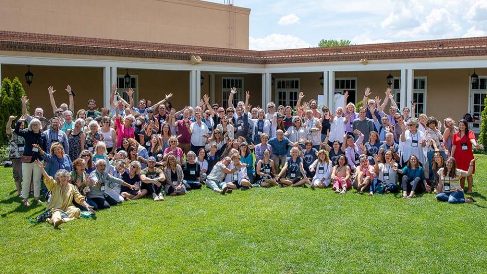 A group photo of most of the members of the 2022 and 2023 cohorts of the Living School, taken in a courtyard of the inn at Albuquerque, New Mexico, in late July (Courtesy of the Center for Action and Contemplation)