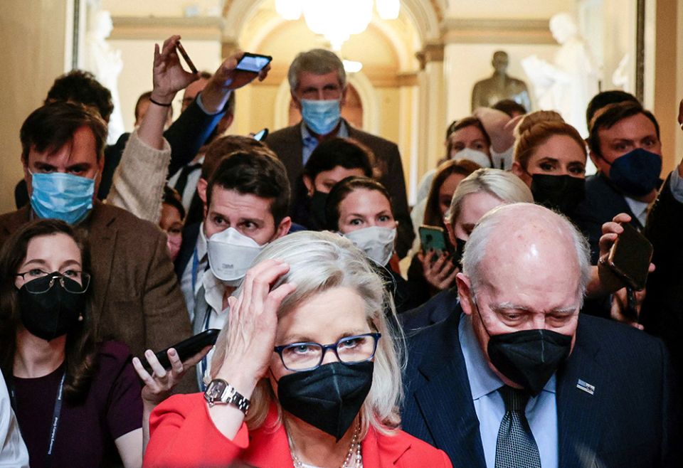 Rep. Liz Cheney, R-Wyo., and her father, former Vice President Dick Cheney, are pursued by reporters after attending a moment of silence event on Capitol Hill Jan. 6 in Washington, the first anniversary of the attack on the U.S. Capitol. (CNS) Rep. Liz Cheney, R-Wyo., and her father, former Vice President Dick Cheney, are pursued by reporters after attending a moment of silence event on Capitol Hill Jan. 6 in Washington, the first anniversary of the attack on the U.S. Capitol. (CNS)