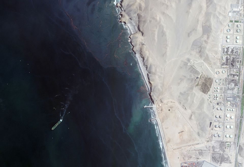 A satellite image shows the Repsol's La Pampilla refinery near Ventanilla, Peru, Jan. 19, after an oil spill. (CNS/Maxar Technologies, handout via Reuters) A satellite image shows the Repsol's La Pampilla refinery near Ventanilla, Peru, Jan. 19, after an oil spill. (CNS/Maxar Technologies, handout via Reuters)