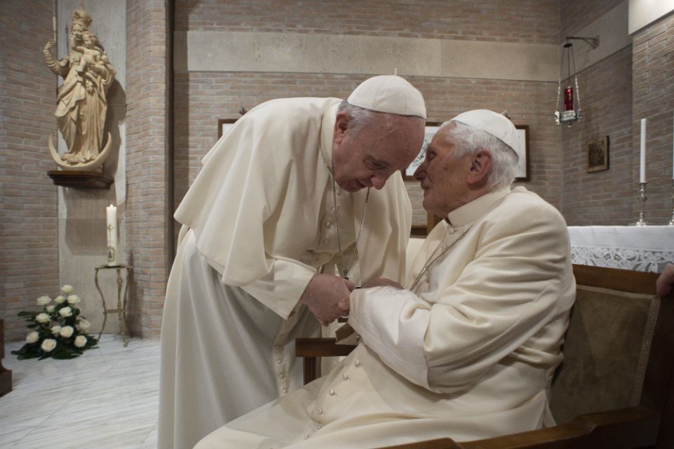 Pope Francis visits with Pope Benedict XVI at the retired pope's residence after a consistory at the Vatican in this Nov. 28, 2020, file photo. (CNS/Vatican Media)