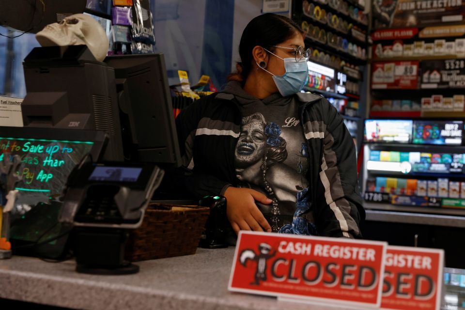 Ariana Mora of Jerome, Idaho, works while 8 months pregnant Oct. 27, 2021. (CNS photo/Shannon Stapleton, Reuters)