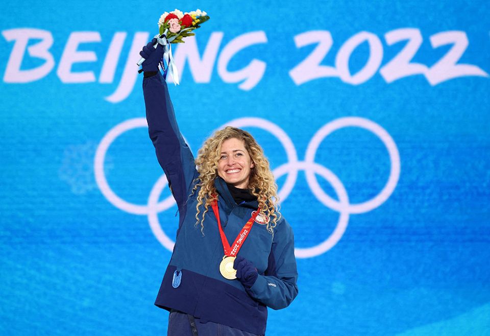 Gold medalist Lindsey Jacobellis of the U.S. celebrates on the podium after winning the women's snowboardcross at Genting Snow Park in Zhangjiakou, China, Feb. 9, during the Winter Olympics. (CNS/Reuters/Kim Hong-Ji)