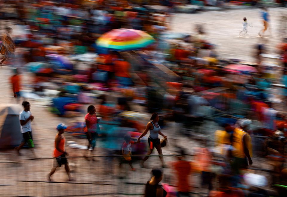 Migrants in Tapachula, Mexico, wait in a stadium Dec. 3, 2021, as they hope to receive help from the Mexican government to obtain humanitarian visas to transit Mexico. (CNS/Reuters/Jose Luis Gonzalez) Migrants in Tapachula, Mexico, wait in a stadium Dec. 3, 2021, as they hope to receive help from the Mexican government to obtain humanitarian visas to transit Mexico. (CNS/Reuters/Jose Luis Gonzalez)