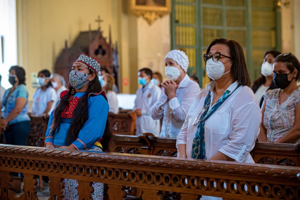 An Indigenous woman is among the people praying in the cathedral in Lima, Peru, during Mass Feb. 13, 2022. (CNS/courtesy Archdiocese of Lima)