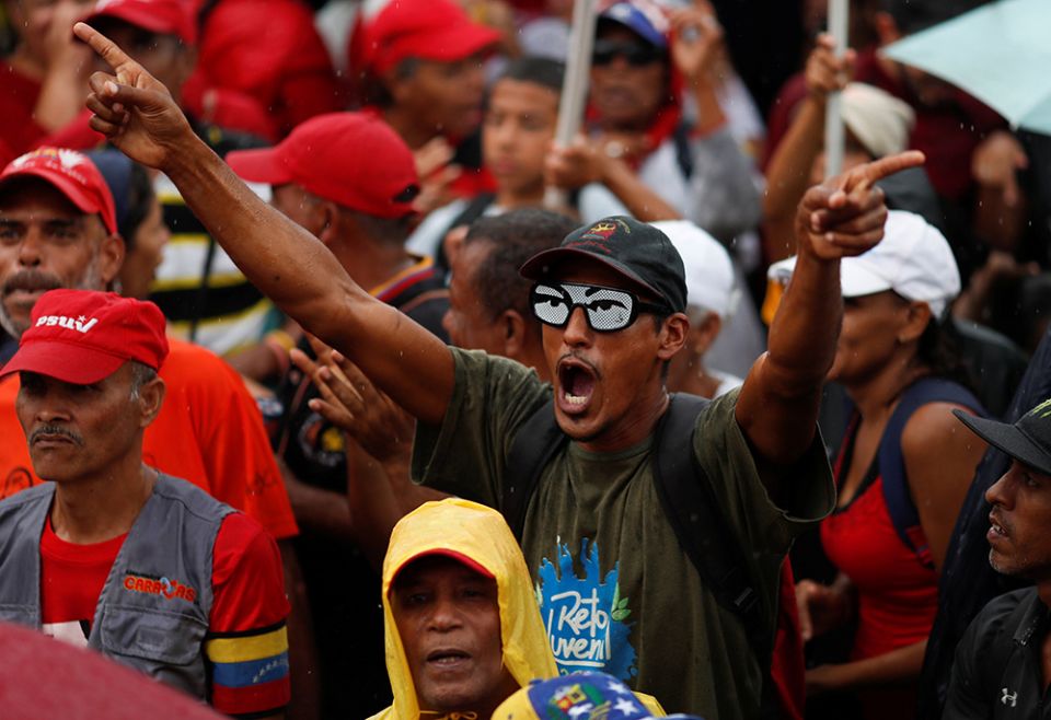 People in Caracas attend a July 13, 2019, rally protesting the findings of a report on human rights in Venezuela issued by U.N. High Commissioner for Human Rights Michelle Bachelet. (CNS/Reuters/Carlos Garcia Rawlins)