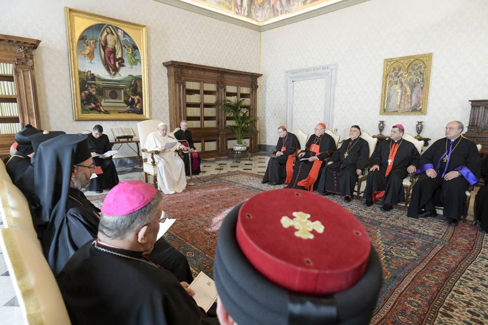 Pope Francis met with an ecumenical group of Christian leaders from Iraq in the library of the Vatican's Apostolic Palace Feb. 28, 2022. (CNS photo/Vatican Media)