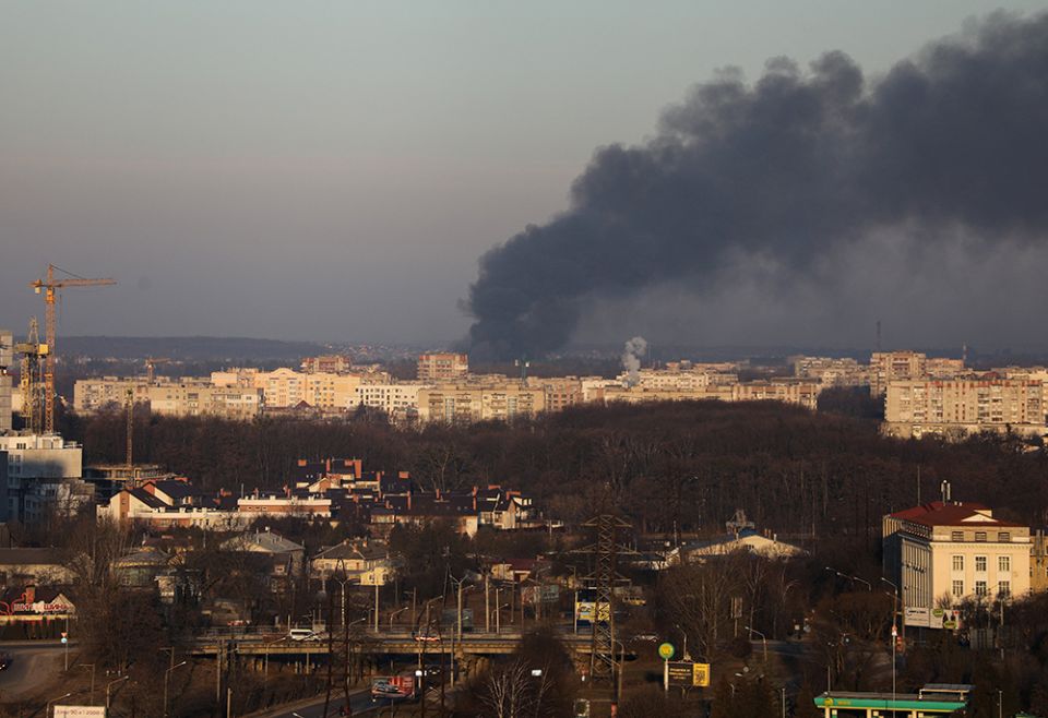Smoke rises above buildings near the Lviv airport, as Russia's invasion of Ukraine continues, March 18 in Lviv, Ukraine. (CNS/Reuters/Roman Baluk) Smoke rises above buildings near the Lviv airport, as Russia's invasion of Ukraine continues, March 18 in Lviv, Ukraine. (CNS/Reuters/Roman Baluk)