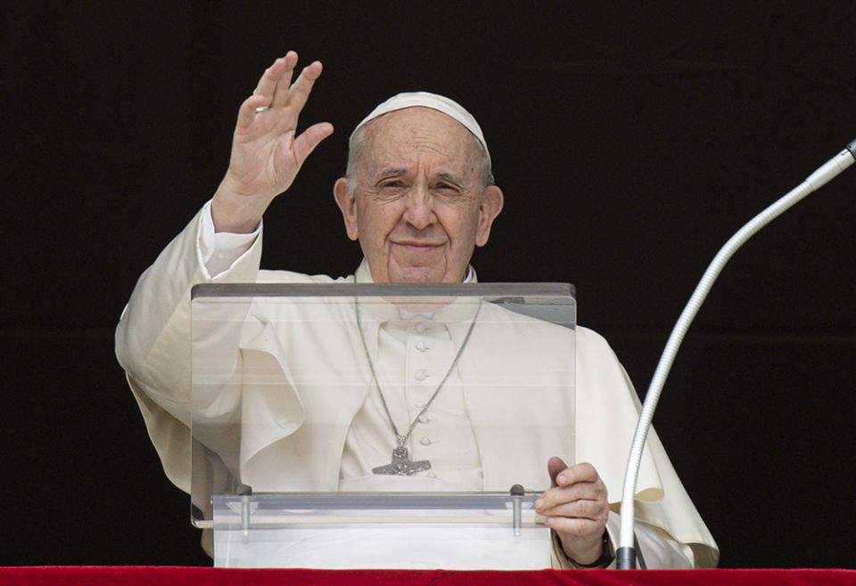 Pope Francis greets the crowd as he leads the Angelus from the window of his studio overlooking St. Peter's Square March 27 at the Vatican. (CNS/Vatican Media) Pope Francis greets the crowd as he leads the Angelus from the window of his studio overlooking St. Peter's Square March 27 at the Vatican. (CNS/Vatican Media)
