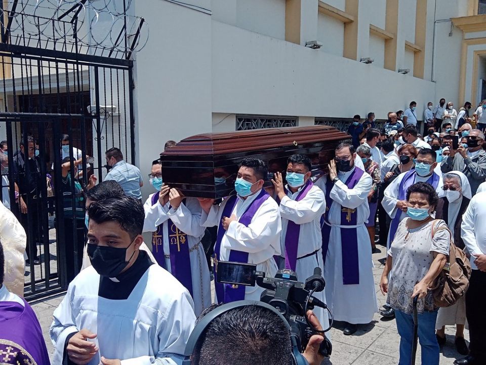 Priests carry the coffin of Archbishop Fernando Saenz Lacalle to the crypt of the cathedral of San Salvador, El Salvador, May 2.