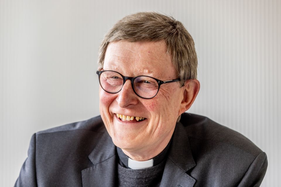 German Cardinal Rainer Maria Woelki of Cologne smiles during a news conference in Cologne May 2, 2022. (CNS photo/Theo Barth, KNA)