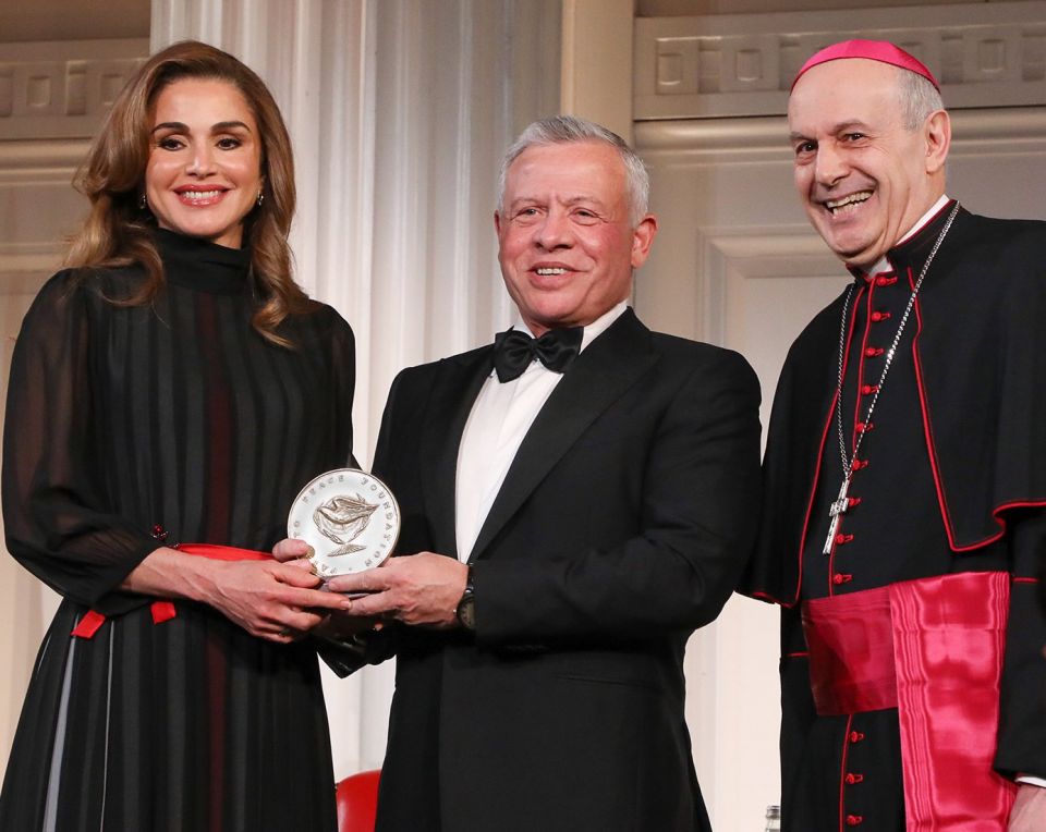 Archbishop Gabriele Caccia, the Vatican's permanent observer to the United Nations, presents the Path to Peace Award to Jordan's King Abdullah II and his wife, Queen Rania, May 9, 2022, in New York City. (CNS photo/Joe Vericker via Permanent Observer Miss