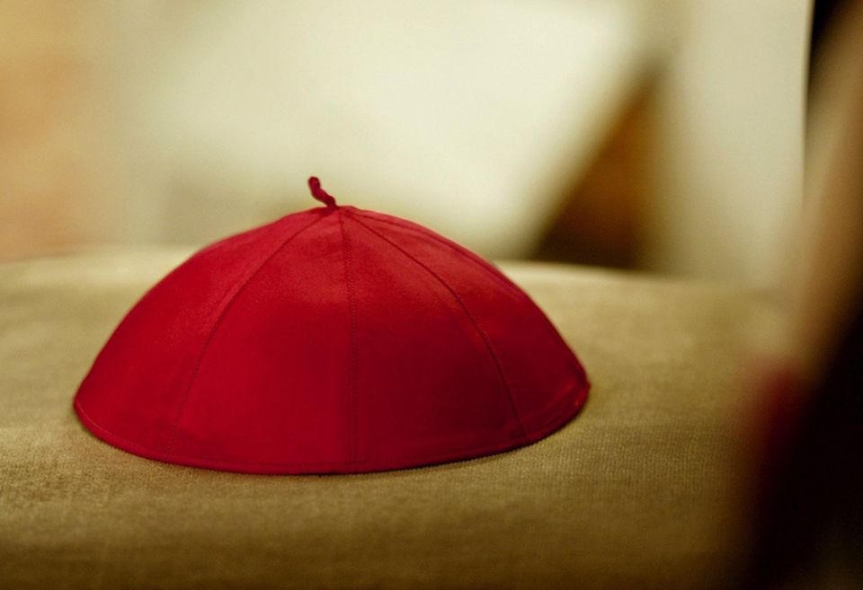 A cardinal's zucchetto, or skull cap, sits on a chair during an ordination Mass at St. Peter's Basilica. (CNS/Reuters/Paolo Cocco)