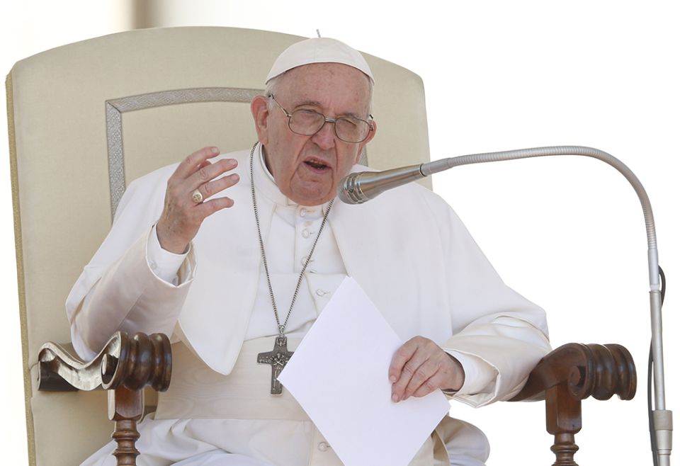 Pope Francis speaks during his general audience in St. Peter's Square June 1 at the Vatican. That day Francis also gave a talk to an international conference of educators. (CNS/Paul Haring)