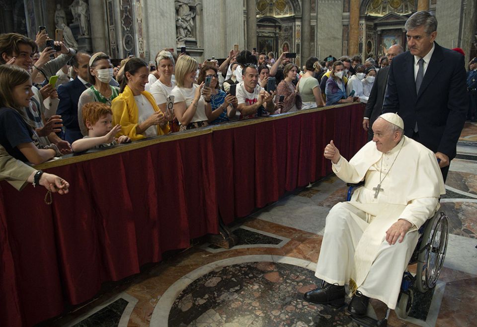 Pope Francis greets people after participating in Mass for the feast of Pentecost in St. Peter's Basilica June 5 at the Vatican. (CNS/Vatican Media)