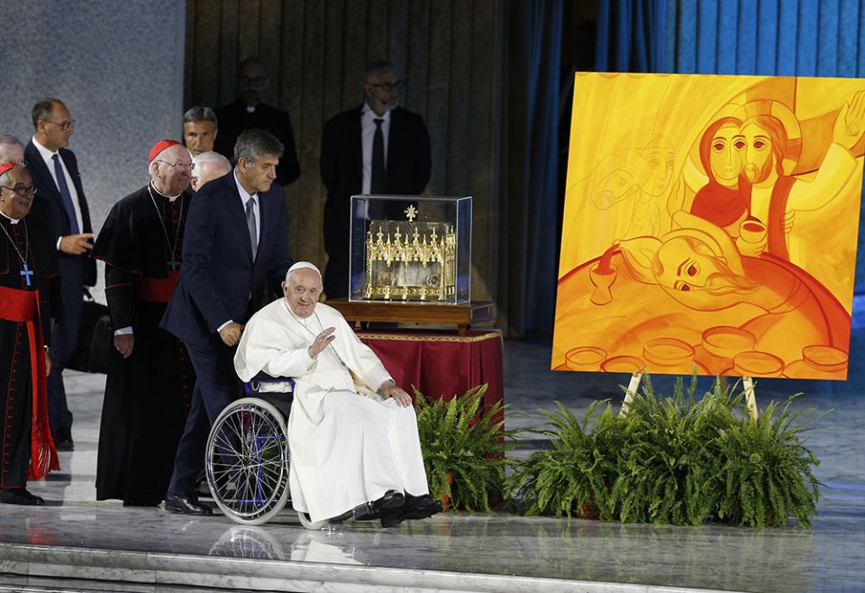 Pope Francis arrives to open the World Meeting of Families in the Paul VI hall June 22 at the Vatican. (CNS/Paul Haring) Pope Francis arrives to open the World Meeting of Families in the Paul VI hall June 22 at the Vatican. (CNS/Paul Haring)