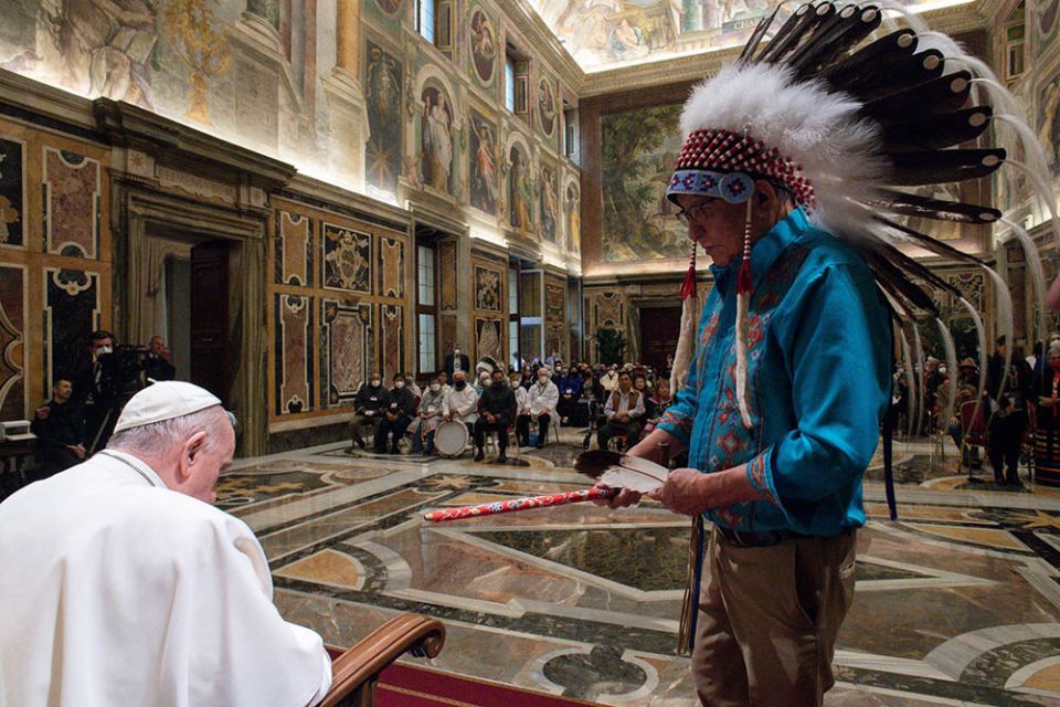 Elder Fred Kelly, a spiritual adviser to the First Nations' delegation that met with Pope Francis, prays for the pope during a meeting with Indigenous elders, knowledge keepers, abuse survivors and youth from Canada. (CNS)