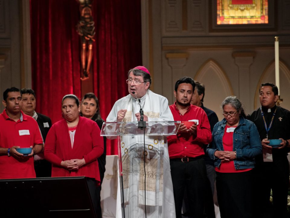 Archbishop Christophe Pierre, apostolic nuncio to the United States, speaks at the the Georgia International Convention Center in College Park, Ga., June 18, 2022, during the last day of the Atlanta Archdiocese's 25th eucharistic congress. 