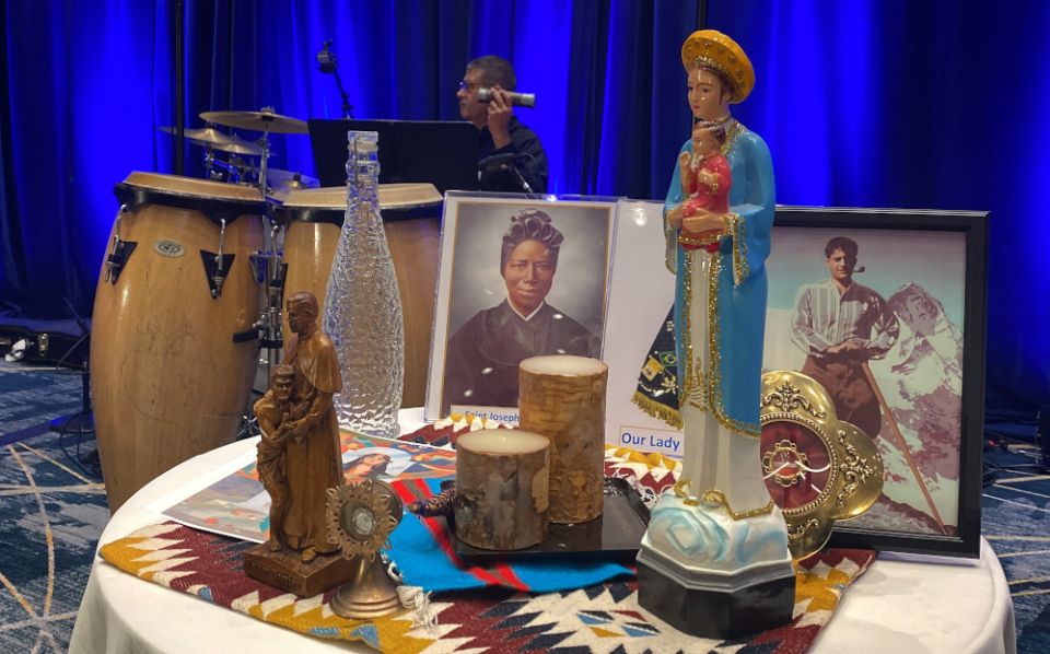 Images in a display at the "Alive in Christ: Young, Diverse, Prophetic Voices Journeying Together" national multicultural gathering in Chicago are seen June 23 the first day of the four-day conference. (CNS/Courtesy of U.S. Conference of Catholic Bishops)