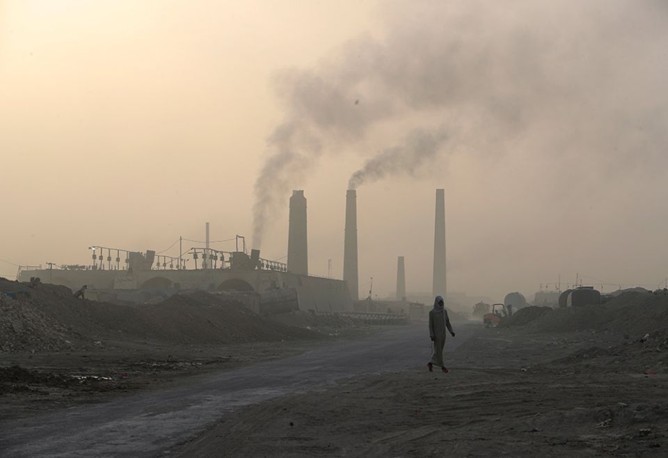 A general view shows brick factories as smoke rises from the stacks in the town of Nahrawan June 5 in Baghdad, Iraq. (CNS/Reuters/Thaier al-Sudani) A general view shows brick factories as smoke rises from the stacks in the town of Nahrawan June 5 in Baghdad, Iraq. (CNS/Reuters/Thaier al-Sudani)
