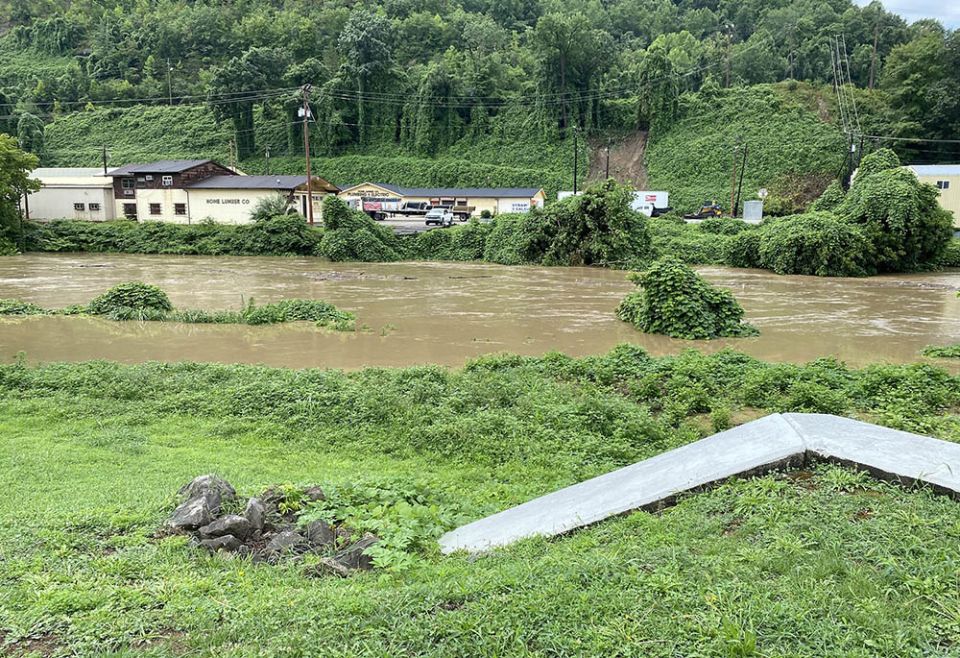 Raging floodwaters are seen in July 28 Hazard, Kentucky. (CNS/Diocese of Lexington/Edward Bauer)