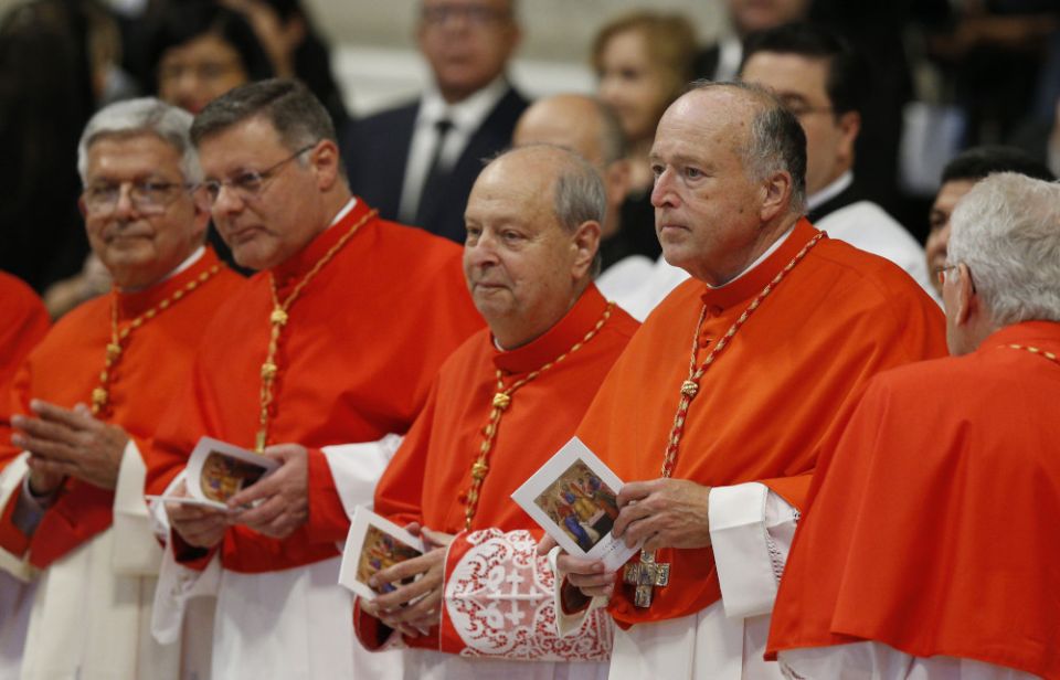  New U.S. Cardinal Robert W. McElroy of San Diego, right, and other new cardinals attend a consistory led by Pope Francis for the creation of 21 new cardinals in St. Peter's Basilica at the Vatican Aug. 27, 2022. (CNS photo/Paul Haring)