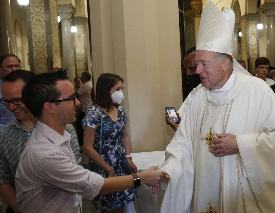 New Cardinal Robert W. McElroy of San Diego greets people after celebrating a Mass of thanksgiving at St. Patrick's Church, official home of the U.S. Catholic community in Rome, Aug. 28, 2022. (CNS photo/Paul Haring)