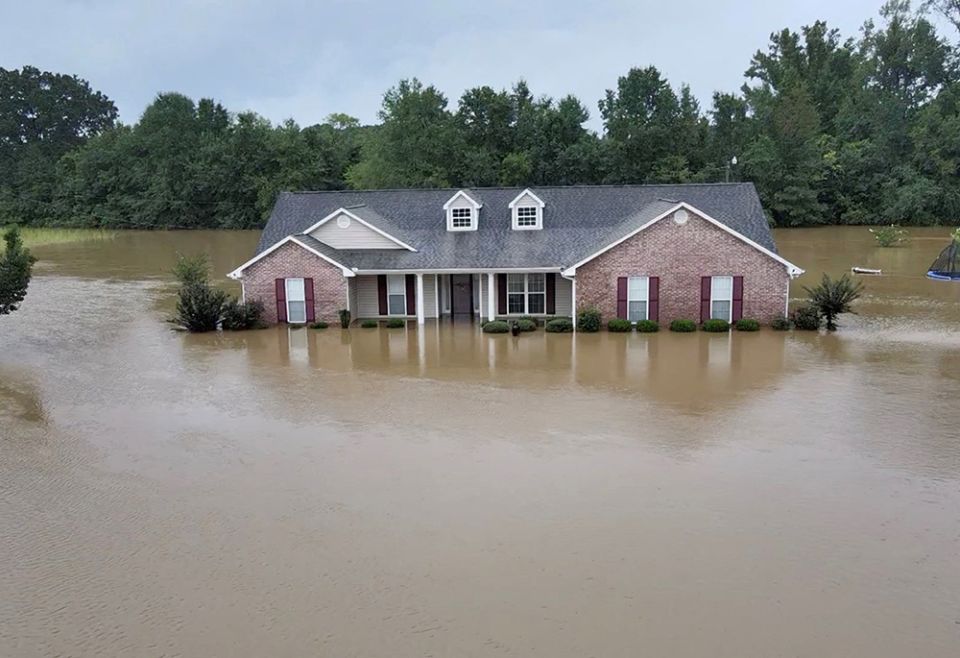 A building in Canton, Mississippi, is submerged amid flooding Aug. 24. (CNS/Tommy Keith Grant via Reuters) A building in Canton, Mississippi, is submerged amid flooding Aug. 24. (CNS/Tommy Keith Grant via Reuters)