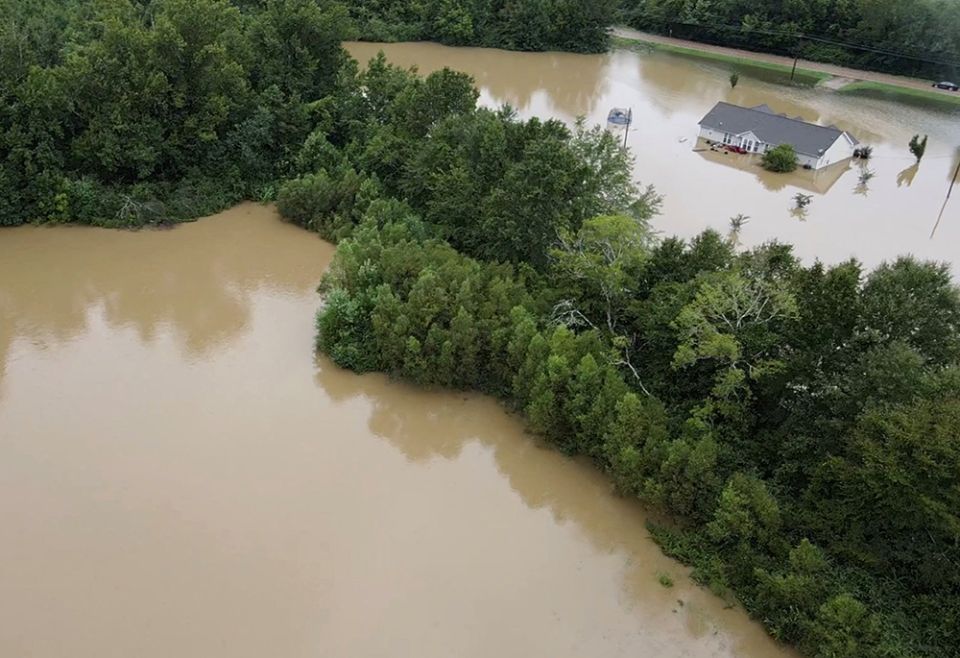 A building in Canton, Mississippi, is submerged amid flooding Aug. 24. (CNS/Tommy Keith Grant via Reuters) 