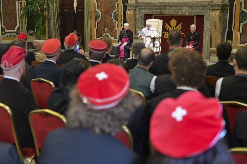 Pope Francis speaks with members of the Society of Swiss Students at the Vatican 