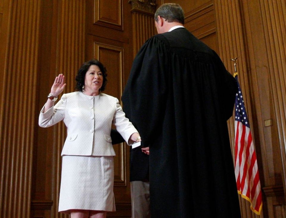 U.S. Supreme Court nominee Judge Sonia Sotomayor is sworn in as an associate justice by Chief Justice John G. Roberts in Washington Aug. 8, 2009. She is the first Latina to serve on the Supreme Court. (CNS/Reuters/Jim Young)