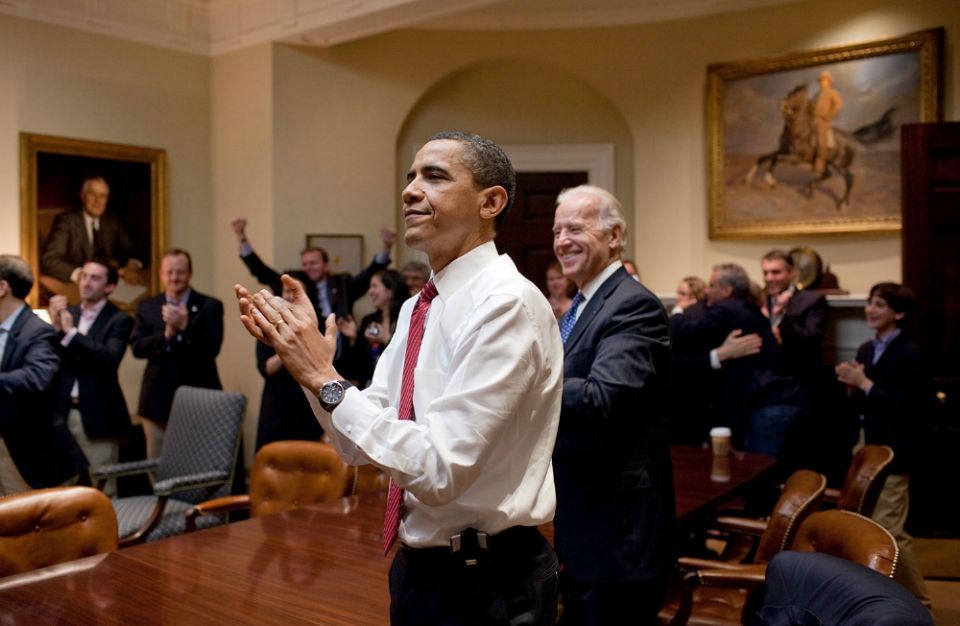 President Barack Obama, Vice President Joe Biden and senior staff react in the Roosevelt Room of the White House as the House passes the health care reform bill March 21, 2010. (Flickr/Obama White House/Pete Souza)