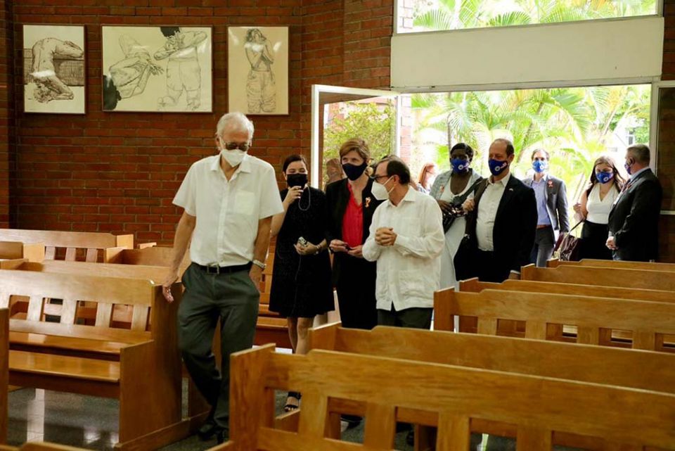 Samantha Power (in red shirt), head of USAID, visits the chapel at Central American University in San Salvador, El Salvador, June 14. (Flickr/USAID)