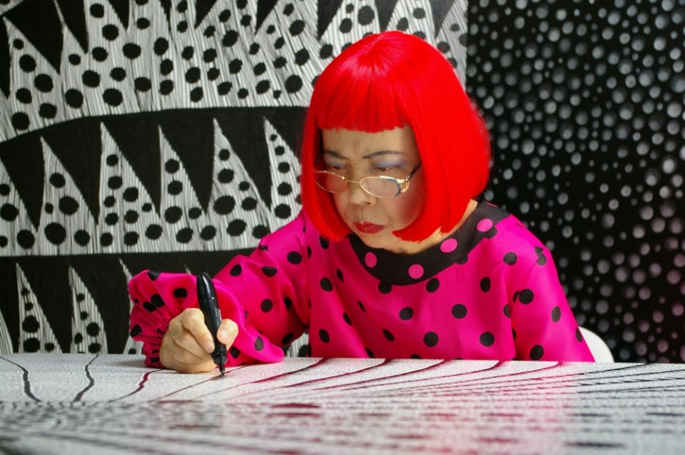 Artist Yayoi Kusama draws in "Kusama: Infinity." (Courtesy of Magnolia Pictures/Tokyo Lee Productions Inc.) Artist Yayoi Kusama draws in "Kusama: Infinity." (Courtesy of Magnolia Pictures/Tokyo Lee Productions Inc.)