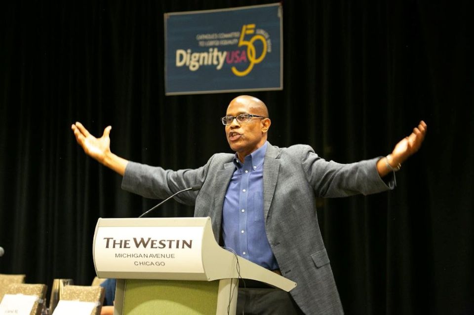 Theologian Fr. Bryan Massingale addresses the 2019 DignityUSA conference in Chicago. The group, which is holding its first in-person conference since 2019, has made some programming changes to make the event safer for participants.