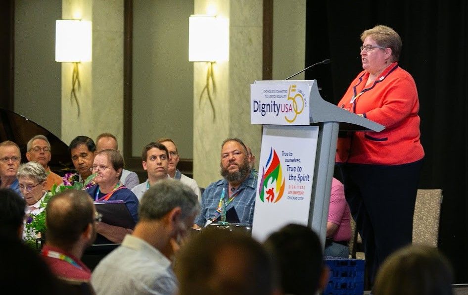 Marianne Duddy-Burke, the executive director of DignityUSA, addresses the group's 2019 conference, held in Chicago. (Courtesy of DignityUSA/Deb Winarski)