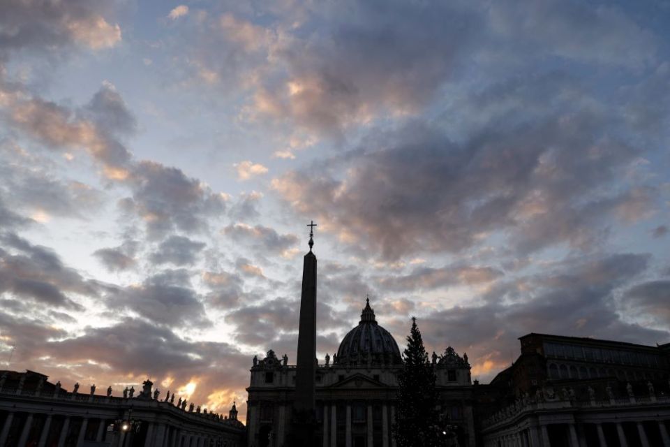 The sun sets behind St. Peter’s Basilica, at the Vatican, Dec. 5, 2019. (AP/Gregorio Borgia)