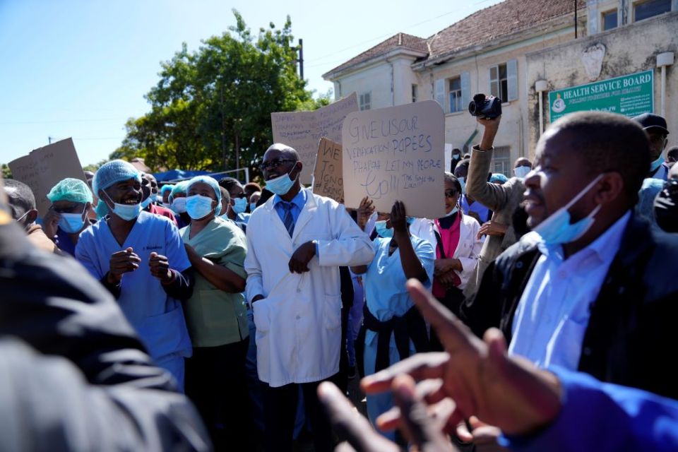 Health workers led by nurses take part in a demonstration over salaries at Parirenyatwa Hospital in Harare, Zimbabwe, June 21. 
