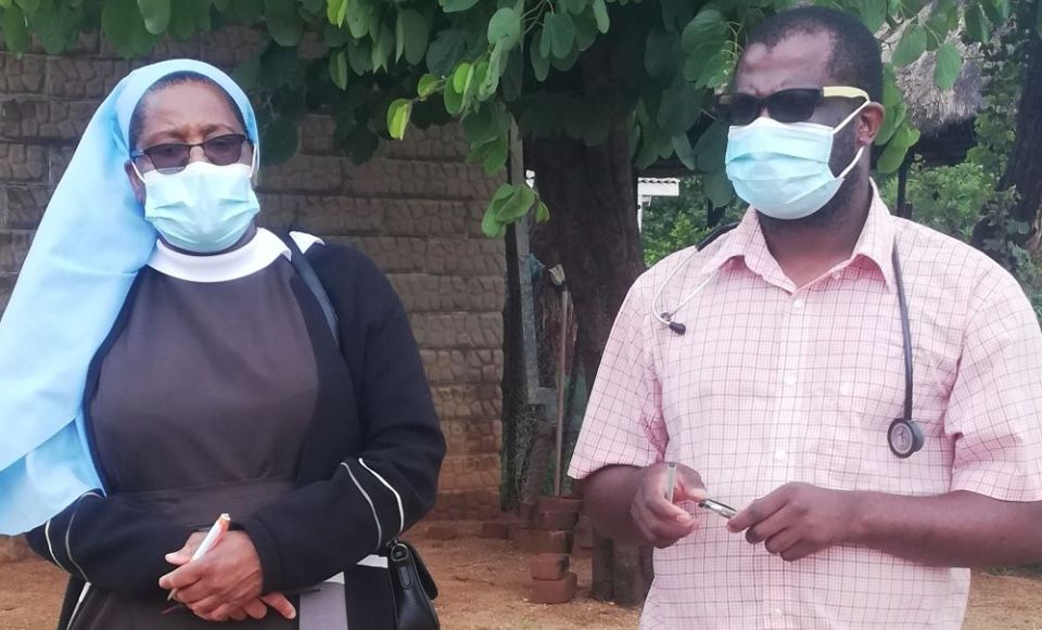 Sr. Fiona Justina Kapita of the Handmaids of Our Lady of Mt. Carmel, health coordinator for the Zimbabwe bishops' conference, stands with Dr. Thabo Sithole at the Catholic-run St. Anne's Mission Hospital in Bulawayo, Zimbabwe.