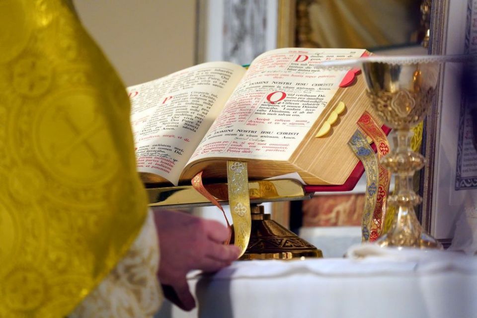 A sacramentary is seen on the altar during a traditional Tridentine Mass July 18 at St. Josaphat Church in the Queens borough of New York City. (CNS/Gregory A. Shemitz)