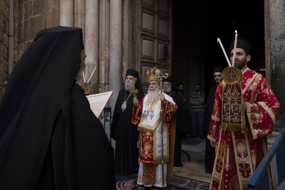 Greek Orthodox Patriarch of Jerusalem Theophilos III, center, walks in procession for the Washing of the Feet ceremony during the orthodox Holy Week at the Church of Holy Sepulchre, Thursday, April 29, 2021. (AP Photo/Maya Alleruzzo) Greek Orthodox Patriarch of Jerusalem Theophilos III, center, walks in procession for the Washing of the Feet ceremony during the orthodox Holy Week at the Church of Holy Sepulchre, Thursday, April 29, 2021. (AP Photo/Maya Alleruzzo)