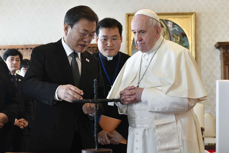 South Korea's President Moon Jae-in exchanges gifts with Pope Francis as they meet at the Vatican, Friday, Oct. 29, 2021. (Vatican Media via AP) South Korea's President Moon Jae-in exchanges gifts with Pope Francis as they meet at the Vatican, Friday, Oct. 29, 2021. (Vatican Media via AP)
