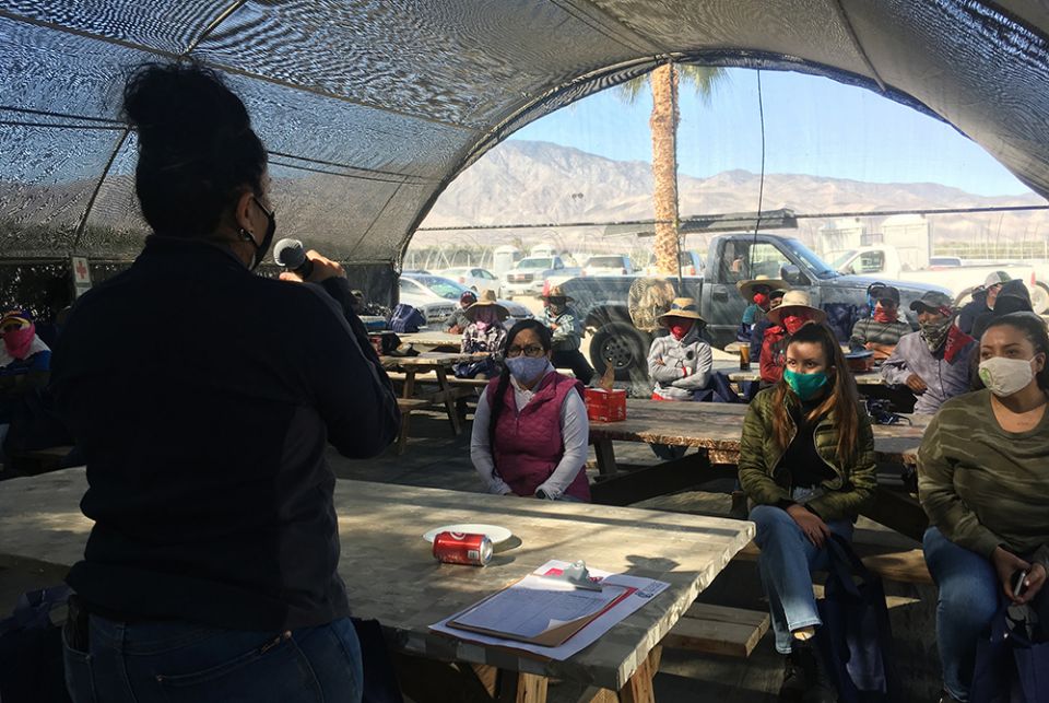 Luz Gallegos, left, executive director of TODEC Legal Center, holds a vaccine information workshop for agricultural workers, March 18, in Thermal, California. (RNS photo/Alejandra Molina)