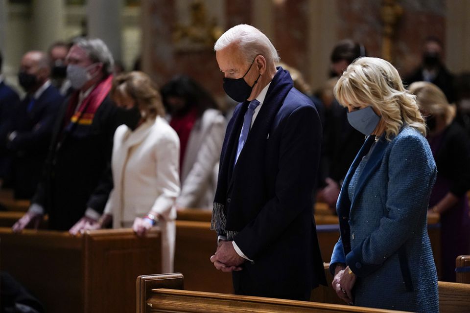 On Jan. 20, then-President-elect Joe Biden and his wife, Jill Biden, attend Mass at the Cathedral of St. Matthew the Apostle during Inauguration Day ceremonies in Washington. (AP Photo/Evan Vucci) On Jan. 20, then-President-elect Joe Biden and his wife, Jill Biden, attend Mass at the Cathedral of St. Matthew the Apostle during Inauguration Day ceremonies in Washington. (AP Photo/Evan Vucci)