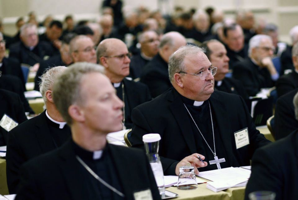 Miami Auxiliary Bishop Peter Baldacchino sits with fellow members of the the United States Conference of Catholic Bishops during a session at the USCCB's annual fall meeting in Baltimore, on Nov. 13, 2017. (AP Photo/Patrick Semansky)