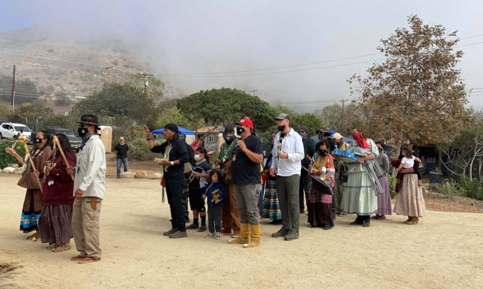 Apache Stronghold, a coalition of Apaches, other Native peoples and non-Native supporters seeking to preserve Oak Flat, arrives at Wishtoyo Chumash Village to begin a ceremonial circle, Sunday, Oct. 17, in Malibu, California. (RNS photo/Alejandra Molina) Apache Stronghold, a coalition of Apaches, other Native peoples and non-Native supporters seeking to preserve Oak Flat, arrives at Wishtoyo Chumash Village to begin a ceremonial circle, Sunday, Oct. 17, in Malibu, California. (RNS photo/Alejandra Molina)