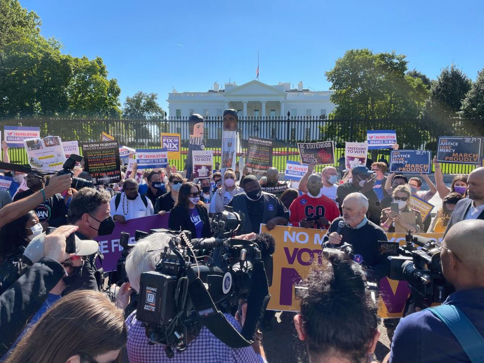 Rabbi David Saperstein, center right with microphone, speaks during a voting rights rally outside the White House on Tuesday, Oct. 19, 2021, in Washington. (RNS photo by Jack Jenkins) Rabbi David Saperstein, center right with microphone, speaks during a voting rights rally outside the White House on Tuesday, Oct. 19, 2021, in Washington. (RNS photo by Jack Jenkins)