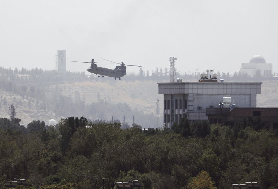 U.S. personnel were evacuated from the U.S. embassy in Kabul, the Afghan capital, as Taliban insurgents broke through the city's defensive line Aug. 15. (AP/Rahmat Gul) U.S. personnel were evacuated from the U.S. embassy in Kabul, the Afghan capital, as Taliban insurgents broke through the city's defensive line Aug. 15. (AP/Rahmat Gul)